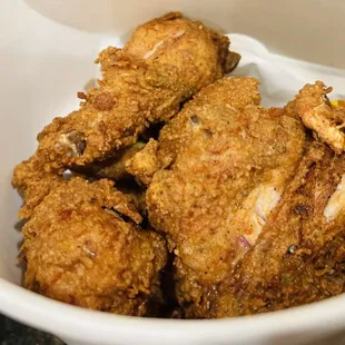 a bowl of fried chicken