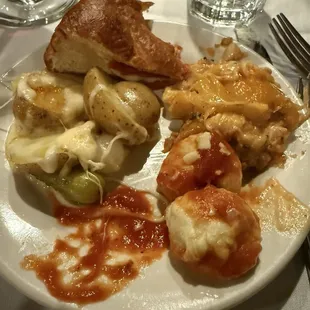 Starting at 12:00(ish) and moving clockwise.. we have a pepperoni roll, some stuffed pepper, gnocchi &amp; raclette.