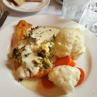 Stuffed trout with spinach and artichokes