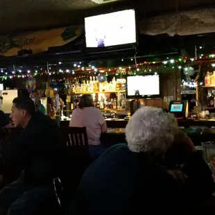 people sitting at a bar