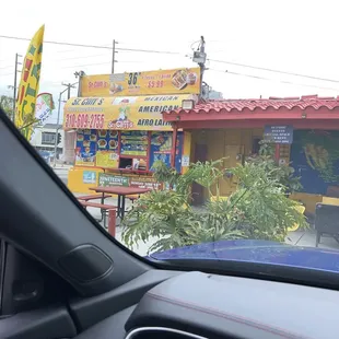 Outside the business waiting for my food.