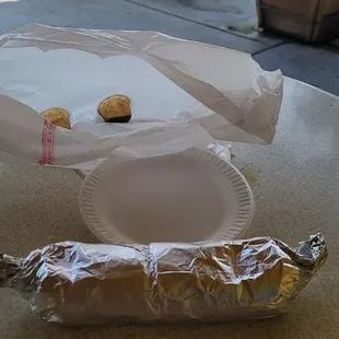 Baby asada burrito, bigger then the plate!!