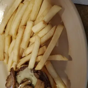 Mushroom and Swiss burger with fries
