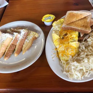 two plates of breakfast food
