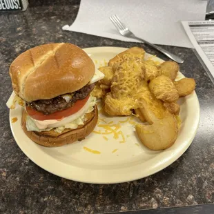Maple-Bourbon Bacon jam Burger with fried potatoes with cheese