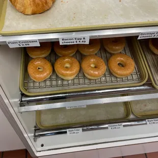 a tray of doughnuts on a rack