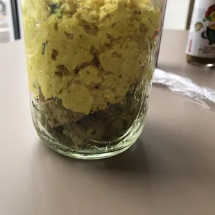 a glass jar filled with food