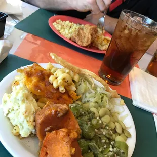 a plate of food and a drink