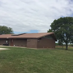 Dated but functional showers, toilets, and lavatory