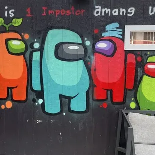 a mural of a group of robots on a wall