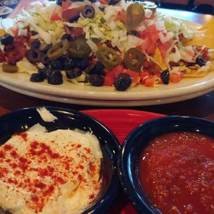 Clives nachos with chili on top.