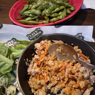 a pan of rice and vegetables