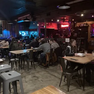 a group of people sitting at tables