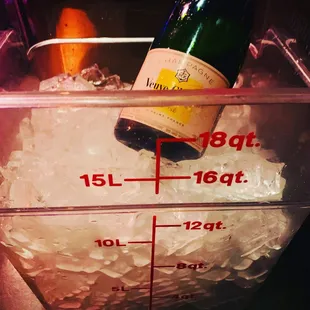 a bottle of wine in ice