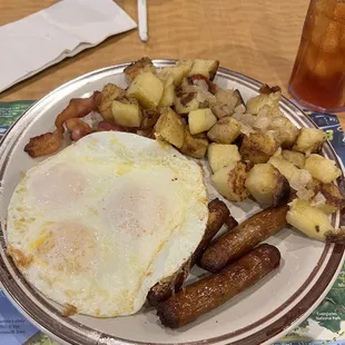 Paul Bunyan eggs, home fries, bacon and sausage