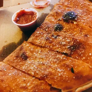 Deeeeliciously huge calzones !!!! Flaky parm dusted crust and gooey stretchy cheese hells yeah