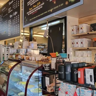 a woman standing in front of the counter