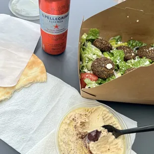 Falafel salad and side if hummus