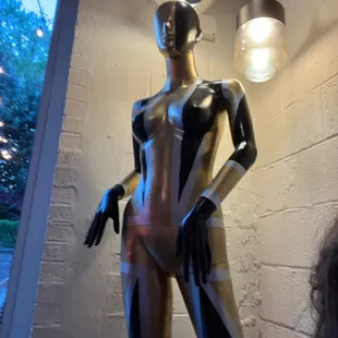 a mannequin dressed in black and white