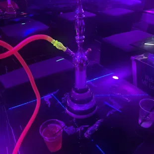 a hookah with neon lights