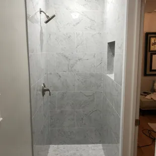 Simple and clean marble look porcelain with 1/32&quot; tight grout joint