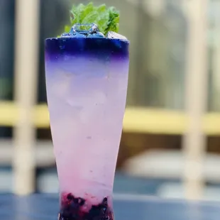 a purple and blue cocktail