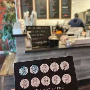 a person holding a business card