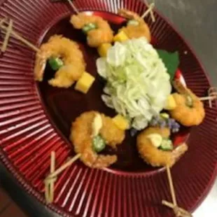 platted fried shrimp, okra and mango on skewer