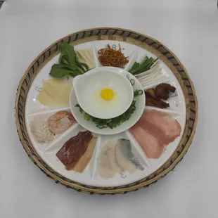 a plate of food on a white table
