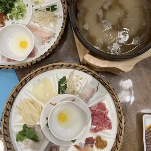 Soup base with condiments