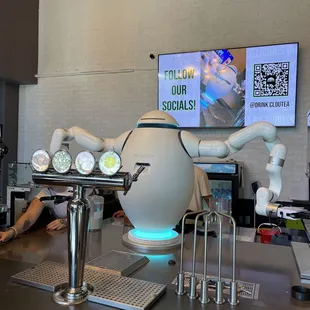 a robotic bartender at a bar