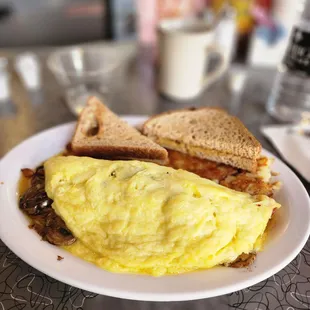 an omelet and sandwich on a plate