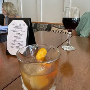 Smokin' old fashioned and glass of wine