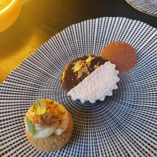 a plate of desserts on a table