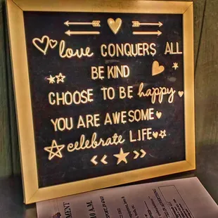 a chalkboard with a quote