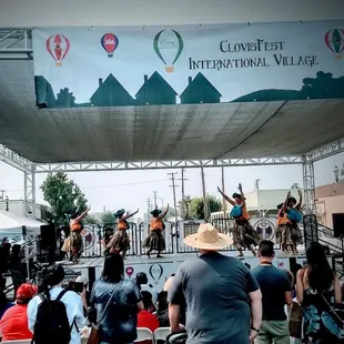 Hula dancers at the international village stage