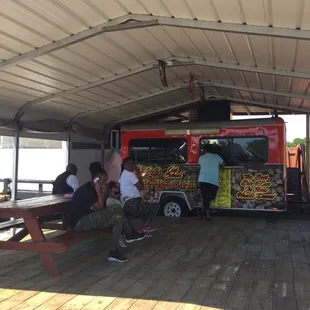 Steady crowd enjoying the smell of the smoker.