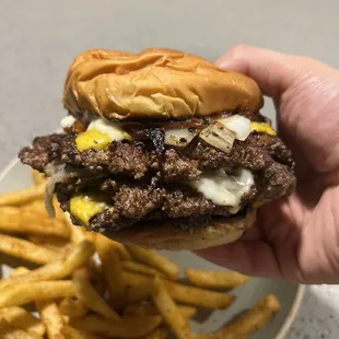 Triple cheeseburger w/ American &amp; Swiss- Mayo, Ketchup, Grilled Onions.