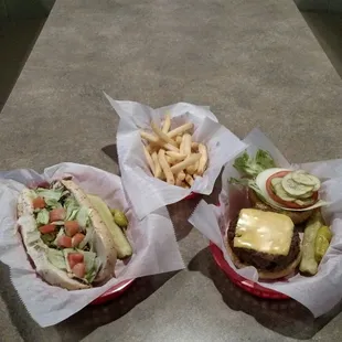 three baskets of food on a table
