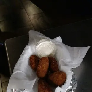 a basket of fried chicken nuggies