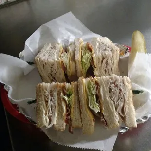 a tray of sandwiches on a table