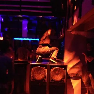 a group of people in a dark room