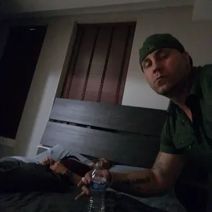 a man and a woman laying in bed