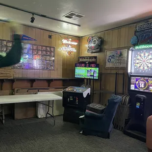 Hot stuff Dave O playing darts with stepdaddies