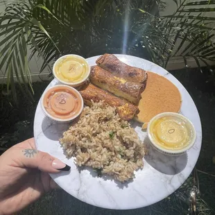 Breakfast sampler plate with guava chiffon &amp; lilikoi &amp; orange syrups