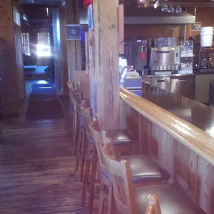 Plenty of room to sit at the bar.  The hallway leads to band and dance area of the bar.