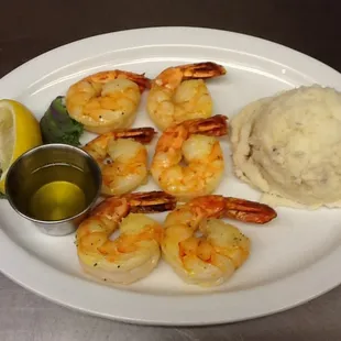 shrimp and mashed potatoes on a plate