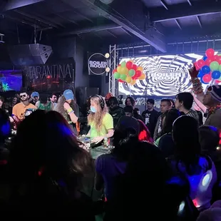 a large group of people at a party