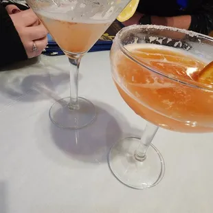 two cocktails on a table