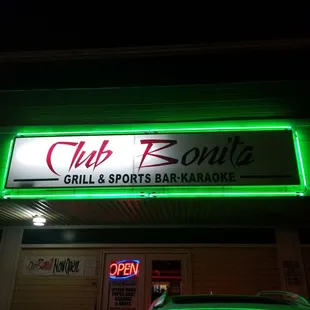 a neon sign for a sports bar